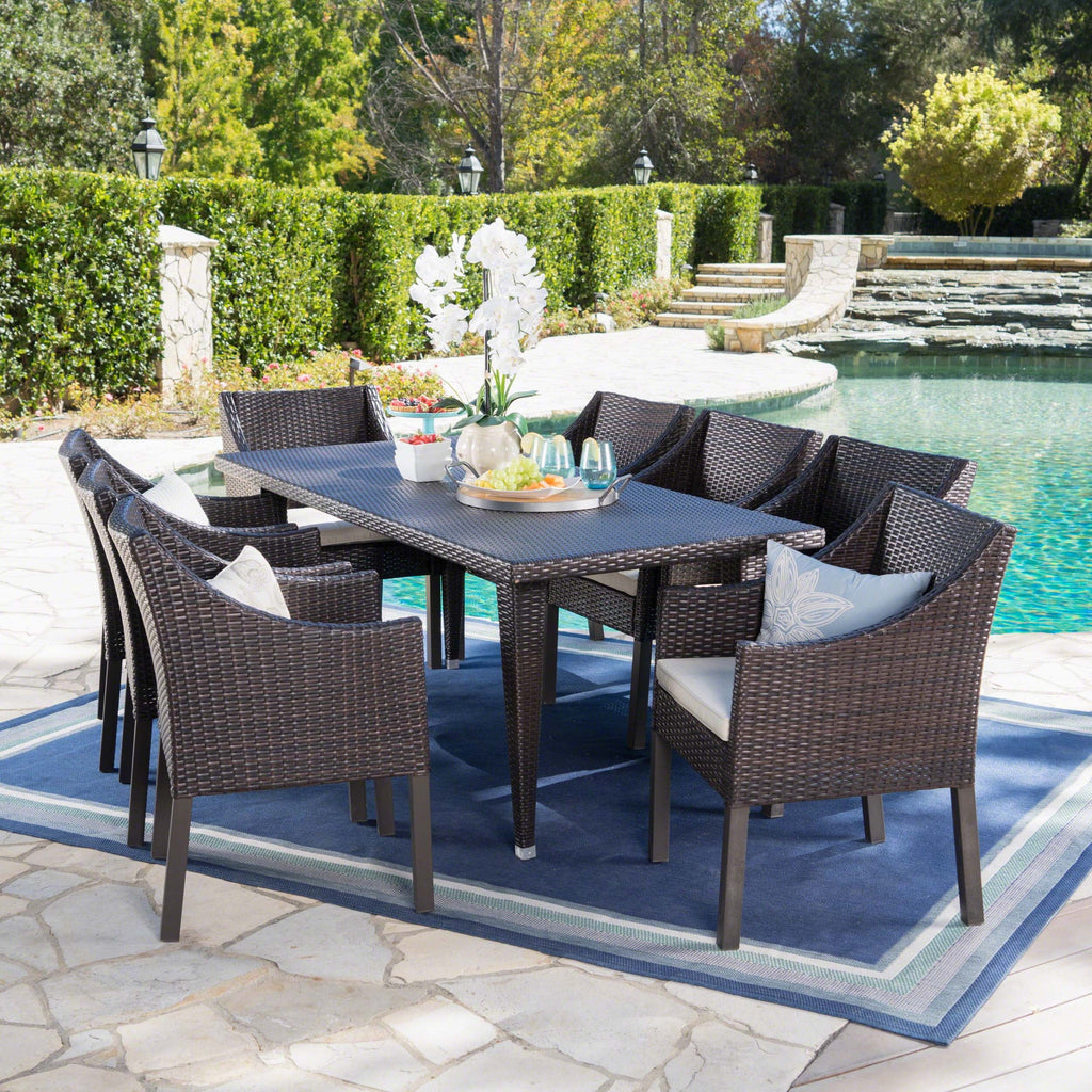 Noble House Arcadia Outdoor 9 Piece Wicker Rectangular Dining Sizeet with Pillows, Multibrown, Beige