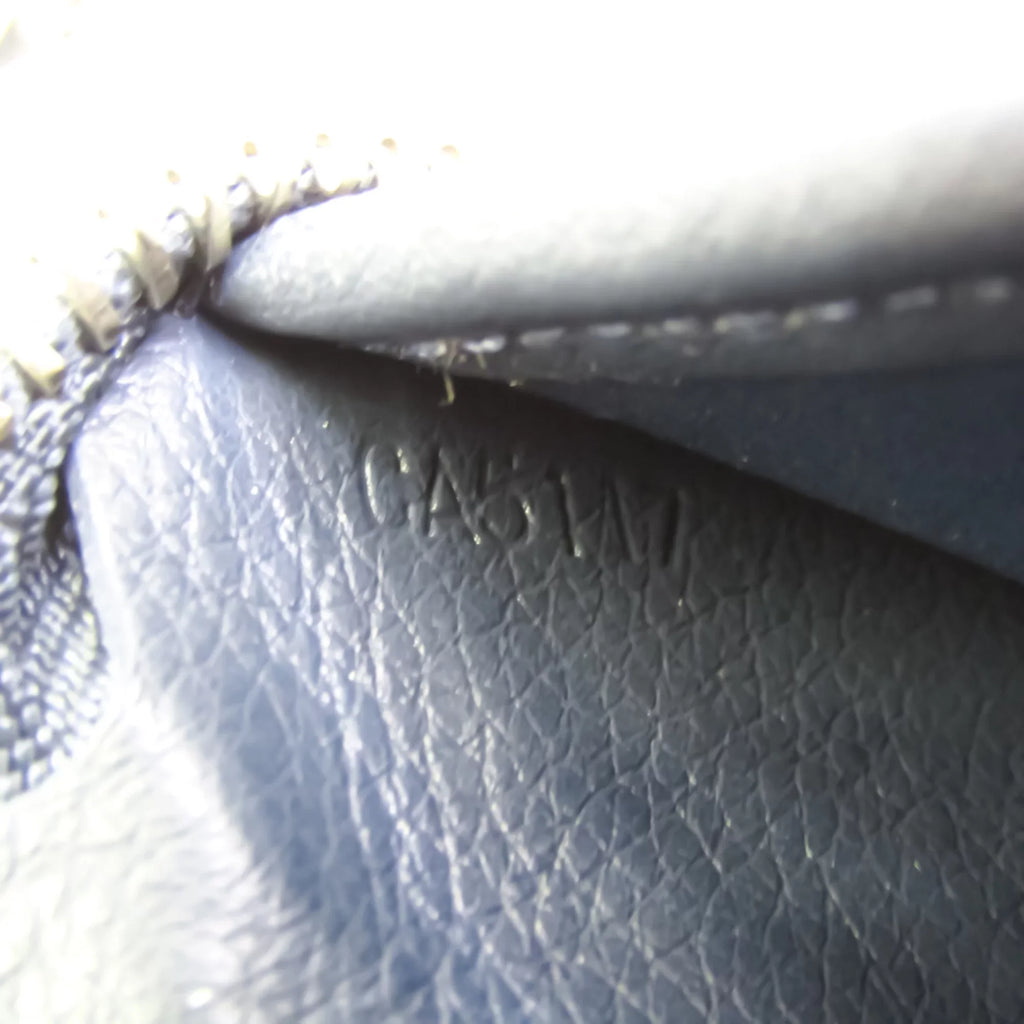 Pre-Owned Louis Vuitton Taurillon Zippy Wallet Vertical M58823 Unisex  Taurillon Leather Long Wallet (bi-fold) Navy (Good)